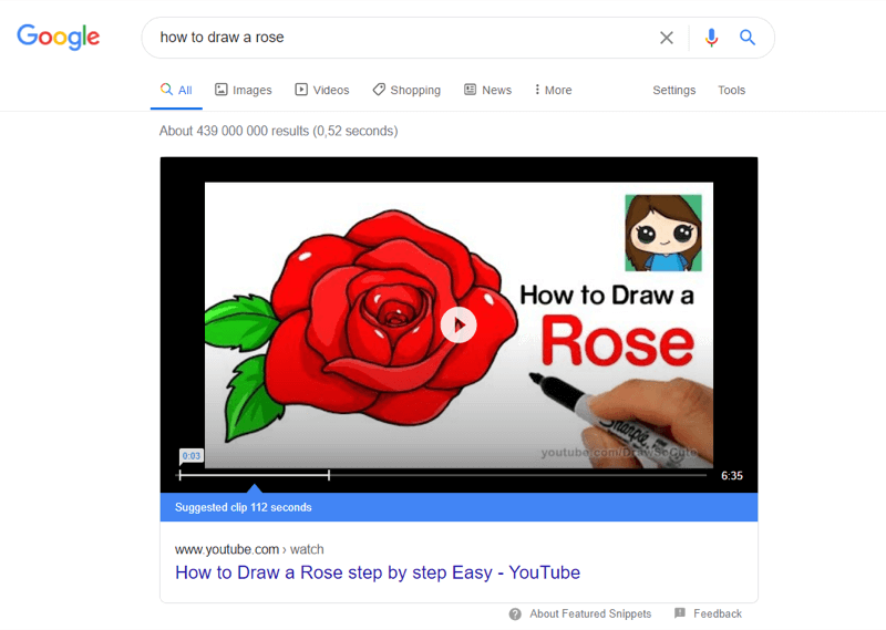exempel på topp YouTube-video i Googles sökresultat för 'hur man ritar en ros'