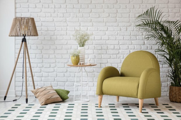 Harmonin av gröna möbler i heminredning