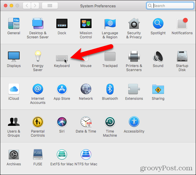 Klicka på Tangentbord i Systeminställningar på en Mac