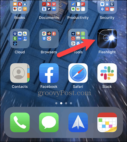 Tryck länge på en ikon på iPhone-skärmen