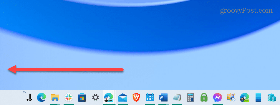 mitten av Windows 10 aktivitetsfält flytta till vänster